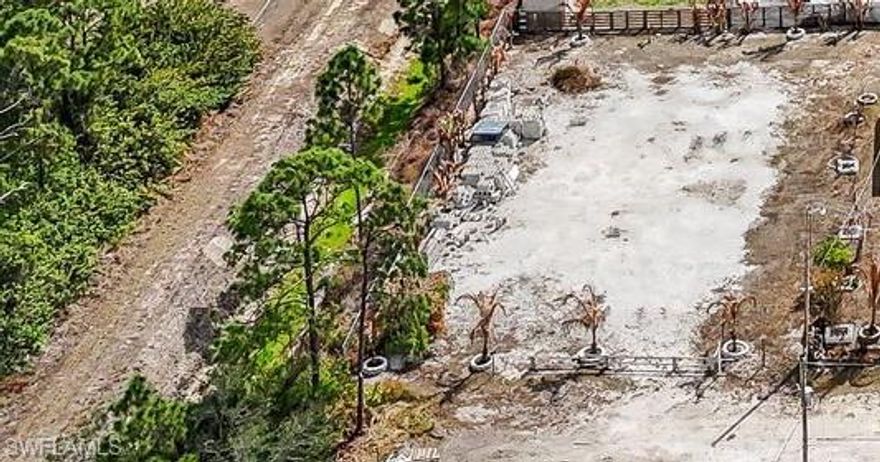 Lot is 100% cleared and filled in with gravel - currently being sold as part of the home next door 2917 4th St W. 
Lot is located on a quite dead end street next to the canal.