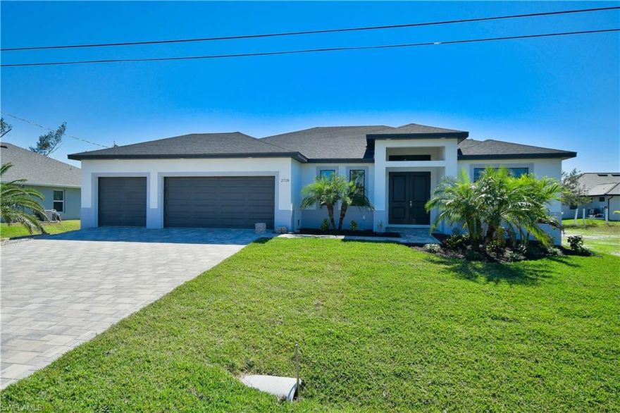 Brand New Construction! SOUTHERN EXPOSURE Pool Home located in super desirable SW Cape Coral! Home features 1,870 square feet of living space, Great room plan, 3 Bedrooms plus a Den, 2 Full Baths and 3 Car Garage. Large lanai with Outdoor Kitchen overlooking the Pool, and spacious sunning deck! Additional features include Stone Access Wall with Fireplace, Porcelain Tile throughout the entire home, Impact Windows, Doors and Sliders, Brick Paver Driveway and Pool Deck, Wood Cabinetry with soft close doors and drawers, Double Tray Ceiling in Living area with Crown Molding, Stainless Steel Appliances, Large Pantry, Laundry Tub with upper Laundry Cabinets for additional storage. Centrally located in SW Cape Coral near shops, restaurants, Marinas, and plenty of Biking and Walking paths! Home has just been completed and ready for occupancy in a few weeks! Start living the Florida lifestyle today!