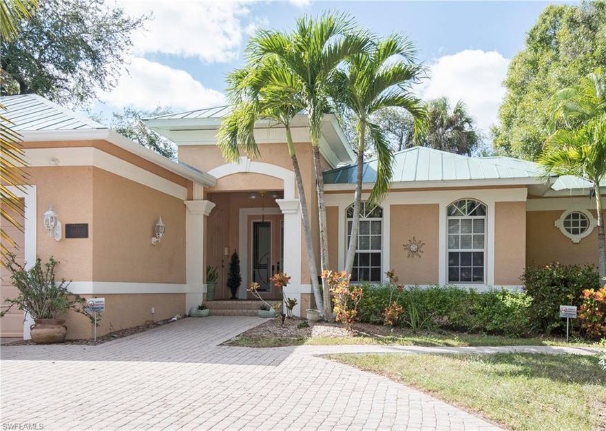 Check this one out!!  Gorgeous contemporary home with a lovely courtyard and pool complete with waterfall,   The Master Bedroom Suite features two large walk in closets, a jetted tub and walk in shower, and French doors. Come see the Custom kitchen complete with granite counter tops, a pantry and eating area overlooking the deck and canal. Guest quarters with their own Kitchenette and Bathroom.  So many upgrades including crown and chair molding, wainscoting, built in TV cabinets, Skylight, intercom, 6 panel doors, inset lighting and Plantation shutters.  Just imagine putting your kayak in the water and off you go to explore the best that Florida has to offer, with a wooden dock that is just 800 feet to the Imperial River. Move in ready!  Easy to show.