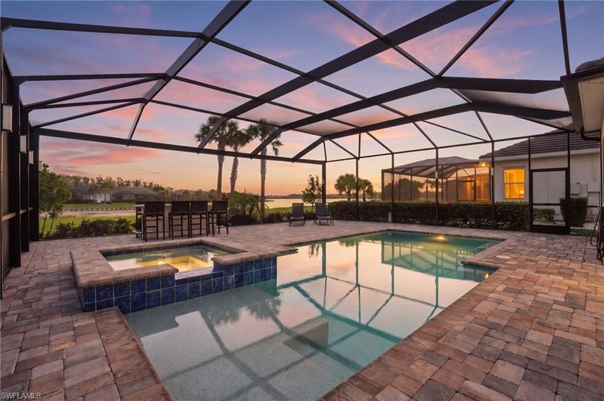 Welcome to 15248 Blue Bay Circle, Fort Myers, FL 33913 — a stunning Angelina floor plan offering 3 bedrooms, 2 bathrooms, and exceptional indoor-outdoor living in the highly sought-after WildBlue community.

This beautifully designed home showcases a massive custom extended pool deck complete with a built-in bar and outdoor kitchen, perfect for entertaining. A unique pass-through window from the kitchen to the outdoor kitchen creates a seamless indoor-outdoor experience. The picture-window lanai screen frames breathtaking views of Vista Lake, a 225-acre boatable lake, and with direct backyard access, you can enjoy boating right from your own property—truly embracing the Southwest Florida lifestyle.

Built with a coastal-inspired design, this home features a flat tile roof. Inside, you’ll find soaring 10–12 ft ceilings with tray details, 8 ft raised-panel interior doors, crown molding in the main living areas and primary suite, and upgraded baseboards throughout. The versatile flex room—ideal as a bedroom or den—features beautiful wood flooring.

The gourmet kitchen is outfitted with wood cabinetry, quartz countertops with a matching backsplash, stainless under-mount sink, designer faucet, soft-close cabinets, pull-out shelving, under-cabinet lighting, exterior-vented range hood, and upgraded appliances. A washer and dryer are also included.

Enjoy modern convenience with additional highlights include hurricane impact windows and sliding glass doors, designer front door, epoxy-finished garage floors, in-wall pest control system, wood closet shelving, and natural gas appliances including a quick-recovery water heater.

Offered turnkey furnished, this home is truly move-in ready—allowing you to immediately enjoy the luxury and lifestyle it provides.

WildBlue residents enjoy world-class, resort-style amenities including an 800-acre lake, resort and lap pools, day spa, fitness center, 6 Har-Tru tennis courts, 8 pickleball courts, full-time tennis director, boat launch with day docks, playground, sport courts, indoor fine dining, and a poolside bar and grill.

Ideally located between Naples and Fort Myers, you’re just minutes from Miromar Outlets, Gulf Coast Town Center, Hertz Arena, Southwest Florida International Airport, top-rated schools, dining, shopping, and the area’s beautiful Gulf beaches.

What makes WildBlue a perfect location? How about a 3,500-acre development which includes 1,329 acres of pristine preserve land and 872 acres of fresh water lakes. All combined, this provides WildBlue residents with opportunities for outstanding outdoor adventures and scenic vistas everywhere you look. Located conveniently off I-75 just 3 miles east on Corkscrew Road, and close to shopping, Gulf Coast Town Center, Southwest Florida International Airport, and local area beaches. Enjoy boating, jet skiing, paddle boarding, fishing, spa and nail salon services, as well as indoor and outdoor yoga.

This is luxury waterfront living!