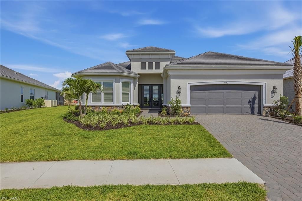 Photo of 15743 Modena ST, NAPLES, FL 34114 (MLS # 226020169)
