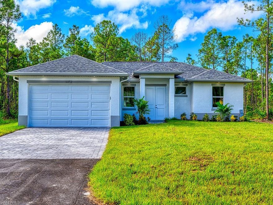 ONE OF THE LOWEST PRICED BRAND NEW HOMES being built in desirable Golden Gate Estates on over an acre of land! Open floor plan features 3 bedrooms, 2 bath, 2 car garage, and upgrades to include solid wood soft close cabinetry, 24x48 tile throughout, granite countertops in kitchen and bathrooms, stainless steel appliances, & IMPACT RESISTANT windows and doors throughout!!! The master bedroom boasts a tray ceiling and recessed lighting. Master bath features a walk-in shower with glass doors and double vanity. Entire home features recessed lighting and fans in living and bedrooms. Laundry room inside home. Gutters throughout and auto sprinkler system. Garage apron, sidewalk, entry and lanai are brick pavers and the remainder of the driveway will be asphalt. Great Location & NO HOA FEES!! USDA eligible area! Can be fully complete in 4-6 months and buyer can still make selections!