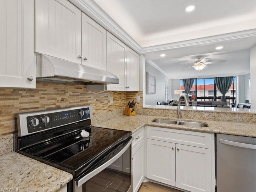 Gorgeous remodeled 6th floor end unit condominium with updated kitchen and baths, all with granite counters. The new flooring is wood look tile. Carport with storage! Four boat lifts are being installed and potentially 14 more lifts! The bathrooms floors & walls are Travertine. All new interior doors. 2014 A/C and newer hot water heater. 2017 stainless appliances plus a newer washer/dryer within the condo! The screened and very private wrap-around balcony has a beautiful side view of the bay and boat docks with an island view showcasing the sparkling lights at night. Very close to the pool, Chickee hut and boat docks. The private entrance to the beach is just across the street! South Seas is one of the few guarded gated communities. The heated condo pool has a great Chickee hut with charcoal and gas barbecue grills. Boat docks & kayak storage are available for rent at very reasonable rates. Clay tennis courts with new Pickle Ball courts! Bocce! Shuffleboard! Walking distance to restaurants and shops. South Seas has everything one could possibly want! Sale includes a separately deeded carport and storage locker valued at over $15K!