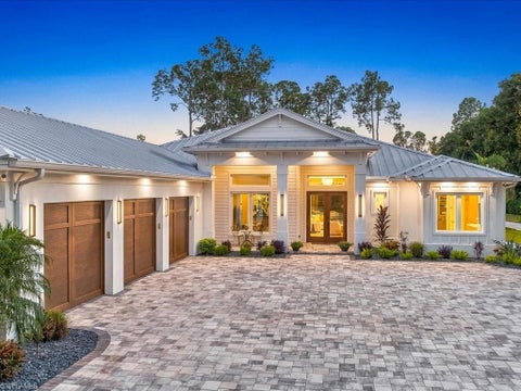 Photo of 6190 Bur Oaks LN, NAPLES, FL 34119 (MLS # 226035391)