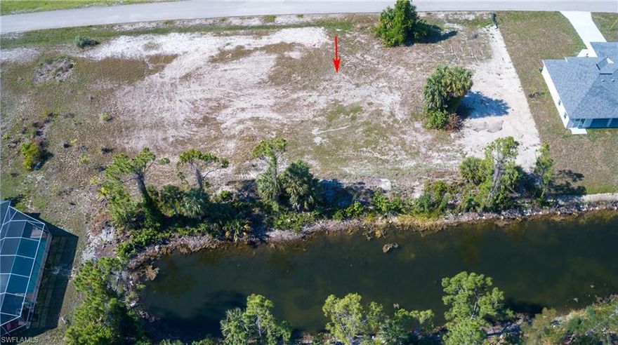 Welcome to your future waterfront paradise! This vacant lot located on a freshwater canal, offering a serene and spacious water view right from your backyard. Nestled in a tranquil neighborhood with newer homes, this location promises peace and quiet, yet it's conveniently close to amenities. Imagine being just minutes away from a shopping center and the vibrant Pine Island Road Corridor, where a plethora of shopping, dining, medical facilities, and more await. Picture yourself waking up to the soothing sounds of nature, with birds chirping and turtles basking in the sun along the canal banks. Spend your days relaxing by the water's edge, casting a line for some leisurely fishing, or exploring the waters by kayak. This isn't just a lot—it's a canvas for your waterfront lifestyle dreams to come true. And with waterfront proper ty being a solid investment choice, this lot offers not just a place to live, but a promising financial opportunity for the future. Don't miss out on the chance to make this slice of paradise yours!  NOT IN A FLOOD ZONE