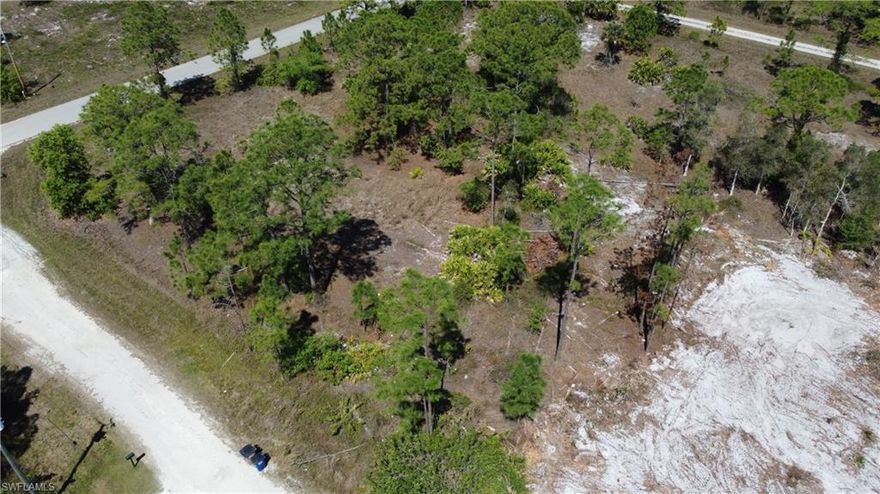 Discover the perfect opportunity to build your dream home or invest in the fast-growing community of Lehigh Acres. This beautiful vacant lot sits directly on a canal, offering peaceful water views and added privacy. Whether you're looking to create a custom home or add to your investment portfolio, this property has endless potential. Located near shopping, dining, schools, and major roads, it offers convenience while still maintaining a quiet, residential feel. With new construction happening all around, this is a great time to secure your spot in one of Southwest Florida’s up-and-coming areas. Don’t miss out on owning a piece of paradise.