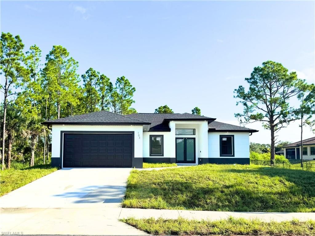 Photo of 103 E 6th ST, LEHIGH ACRES, FL 33972 (MLS # 226020844)