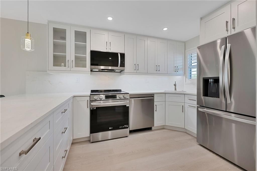 Photo of 9 High Point CIR N #108, NAPLES, FL 34103 (MLS # 226009695)