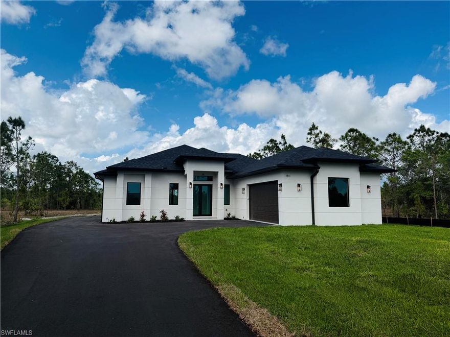 JUST FINISHED APRIL 2026 NEW CONSTRUCTION HOME!! 3+DEN AND 2 BATHS. This 1.14 Lot is mostly cleared. Added asphalt on the left side adds the ability to drive to the back of the property. This home is perfectly situated at the end of a quiet street for added privacy and minimal traffic. Ideal for those seeking both quality and calm.
This property offers serene atmosphere while still being conveniently located near local shops and parks. Just minutes from Publix. Enjoy this modern design with multiple upgrades such trey ceilings with crown moldings and lights, tile in the whole house, impact windows and doors, epoxy garage floors, all appliances, modern kitchen and bathroom cabinets and Reverse Osmosis for the whole house!!