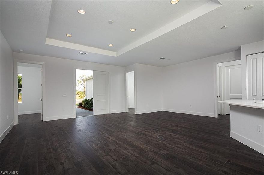 Just getting started.  The Orquidea model by Fl-Star Construction.....Pick all of your own finishes..Standard are luxury vinyl...granite counters...beautiful kitchen backsplashes...stainless appliances...washer and dryer...landscaping and sprinklers.