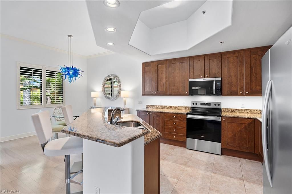 Photo of 965 Sandpiper ST #J204, NAPLES, FL 34102 (MLS # 226013097)