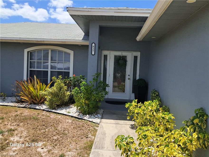 *** The property has a NEW ROOF installed in the 2020. Permit ROF2020-00741 *** Beautiful house in excellent neighborhood of Lehigh Acres, Florida. 2020 Shingle Re-roof. The metal fence was installed in 2021. The Seller is very motivated. MAKE AN OFFER!!!!!!!