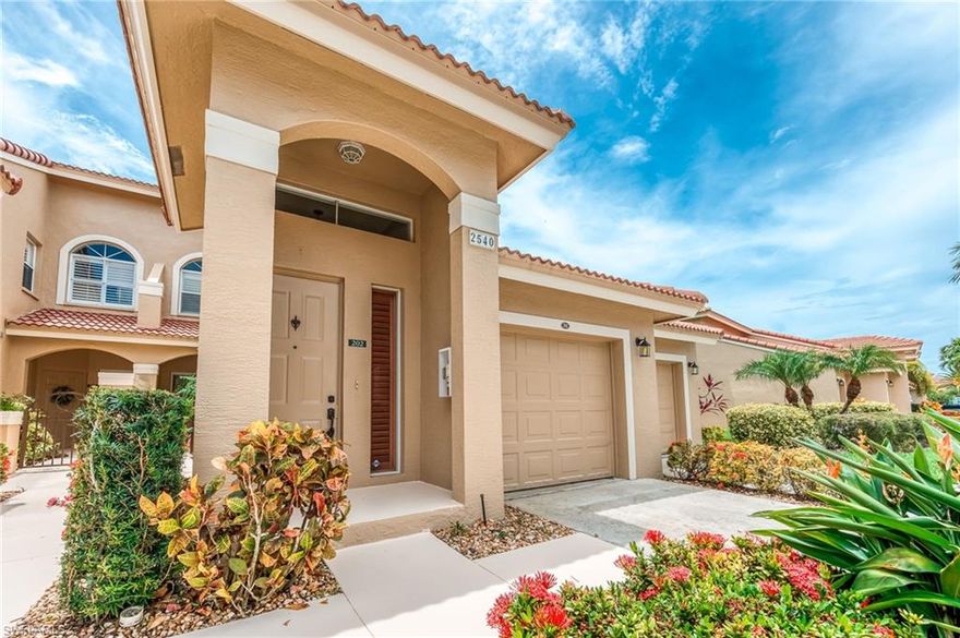 Beautiful North Naples coach home on the lake.  Tastefully updated kitchen, baths, flooring.  Enjoy the lake from your wrap around lanai with enclosure.  Quiet street.  Attached garage.  The master bedroom features the lake view, lovely vanity, frameless shower doors.  The second bedroom is large enough to be a second master with a walk-in closet and a door to the second bath.  The third bedroom has double doors leading the the lanai with a view of the lake.  Spacious floor plan with the kitchen, living, and dining areas flowing together.  The sought-after community of Huntington Lakes features three pools, a clubhouse with fitness center, billiards, community rooms hosting many social events.  Tennis and bocce are big activities here along with walking and biking.  All appliances purchased within two years.  Newer roof, fresh exterior paint.    You will love this stately home and this well-appointed community.  This information is deemed reliable but must be independently verified.