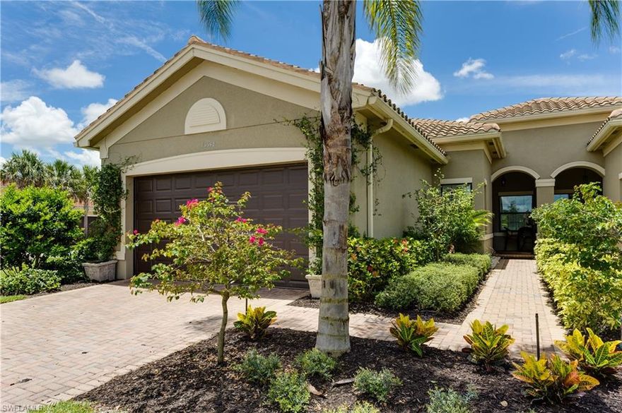 V.3014 - Highly desirable villa on a beautifully landscaped corner lot.  Sunny southern exposure creating an abundance of  natural light, with its flow of clean lines, designer finishes and special touches throughout. Gourmet kitchen with quartz countertops and island that accommodates seating for 8. Entertain with ease as living room has built-in cabinetry with storage along with a wine fridge for entertaining. Privacy abounds in this split floor plan layout. The spacious Master bedroom boasts 2 walk-in closets and a luxurious master bath. There is plenty of space afforded by the practical shelving, drawers & hanging racks as well as a 2 car garage.  Outside living area offers both a screened in lanai and an extended patio for enjoyment and entertaining. Conveniently located across from the Marbella Isles clubhouse, which offers a resort style pool, fitness center, tennis, pickleball & more. All of these wonderful amenities are located in the most central location of Naples, close to white sandy beaches, shopping, & fine dining.