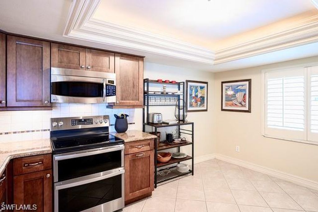 Photo of 601 Beachwalk CIR #L-104, NAPLES, FL 34108 (MLS # 226003517)