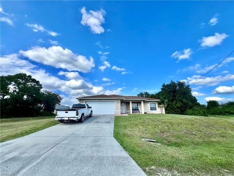 Photo of 2916 51st ST SW, LEHIGH ACRES, FL 33976 (MLS # 2025018425)