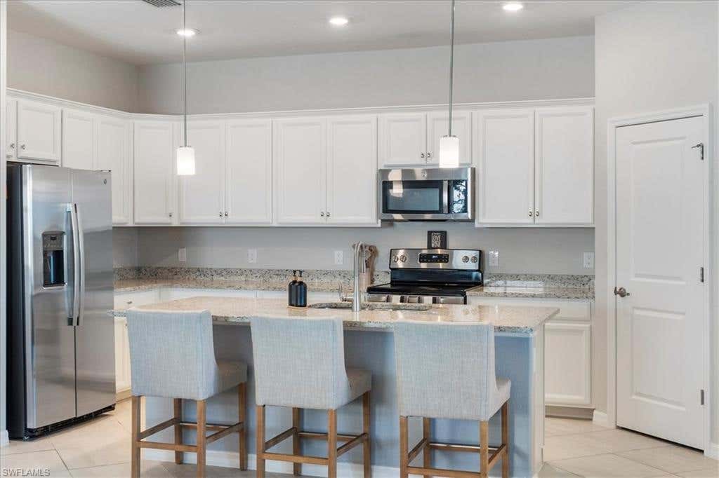 Photo of 14698 Portico BLVD, FORT MYERS, FL 33905 (MLS # 226027351)