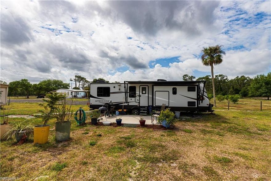 For Rent!  This charming property features 1 bedroom, 1 bathroom, and a private area perfect for enjoying the Florida sunshine.  This Furnished RV is ready to move in.  Lots of Privacy.  Water/ Electric included.  Imagine sipping your morning coffee, surrounded by the sounds of nature. Located in a quiet neighborhood, yet just a short drive away from shopping, dining, and entertainment options, this property truly offers the best of both worlds. Don't miss out on the opportunity to make this charming manufactured home your own slice of paradise in North Fort Myers. Schedule a showing today and start envisioning the possibilities for this delightful property!