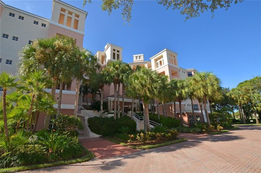 This unique building has only 4 units with a large lanai and outside balcony.  The large lanai is screened and has sliding glass doors.  The front room has a great built-in wet bar (great for entertaining).  New cabinets in kitchen and wet bar.  New appliances in kitchen.  New tile in kitchen and dining.  Pelican Landing has great amenties, including canoeing, tennis and private beach park.  The building has easy access through elevators with 2 parking spaces under building and private storage closet. Community heated pool & spa just a short walk. Great location for Tennis enthusiasts. Turnkey