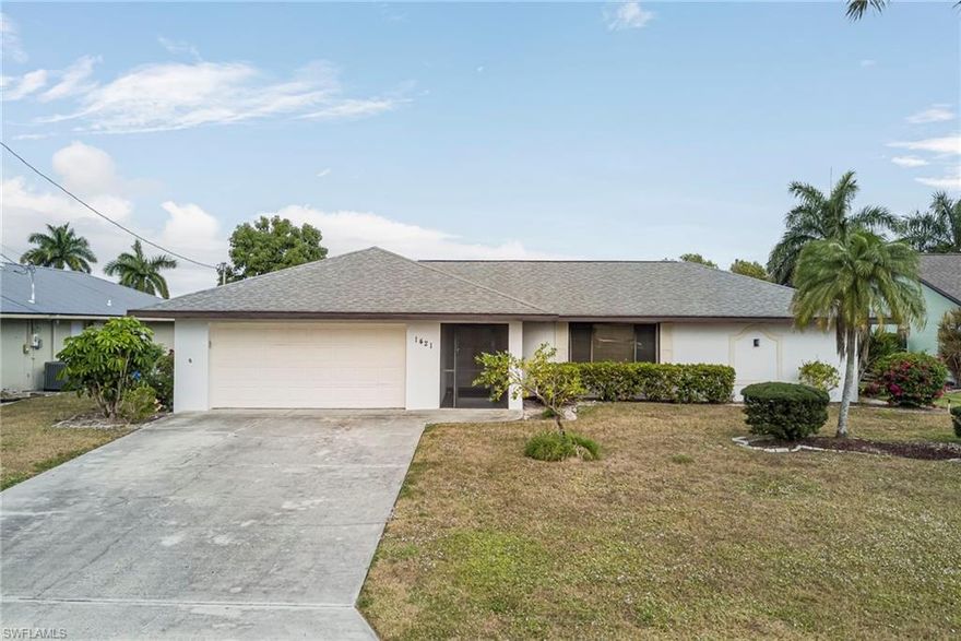 Exceptional value for a GULF ACCESS home in Cape Coral in FLOOD ZONE X and direct waterfront living at a price reflective of minor cosmetic needs. This spacious 3-bedroom, 3-bath residence provides over 1,700 square feet of living area with a desirable split floor plan designed for privacy and flexibility.

The home features both a formal living room and family room, along with dedicated dining area, creating ample space for everyday living and entertaining. The kitchen has been partially updated and offers functional workspace with opportunity for further personalization.

Recent major improvements include a newer roof, A/C system, and hot water heater, providing peace of mind for the next owner. Flooring throughout consists of laminate and tile, offering durability and easy maintenance.

Outdoor living is a highlight, with a screened, tiled lanai under truss, below-ground pool, and concrete dock offering quick Gulf access—ideal for boating and waterfront enjoyment. Hurricane shutters provide added storm protection.  Tallest bridge in area to open waterway!

The third bedroom and bath feature a private entrance from the garage, making it ideal for guests, in-laws, or a home office setup. Additional features include double entry doors, city water and sewer, and no assessments.

While the property requires some cosmetic updates, the price reflects the opportunity, making this one of the best values currently available for a Gulf access home in the area.