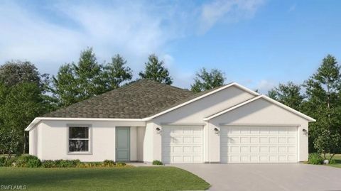Photo of 345 Parish DR, LEHIGH ACRES, FL 33936 (MLS # 225078420)