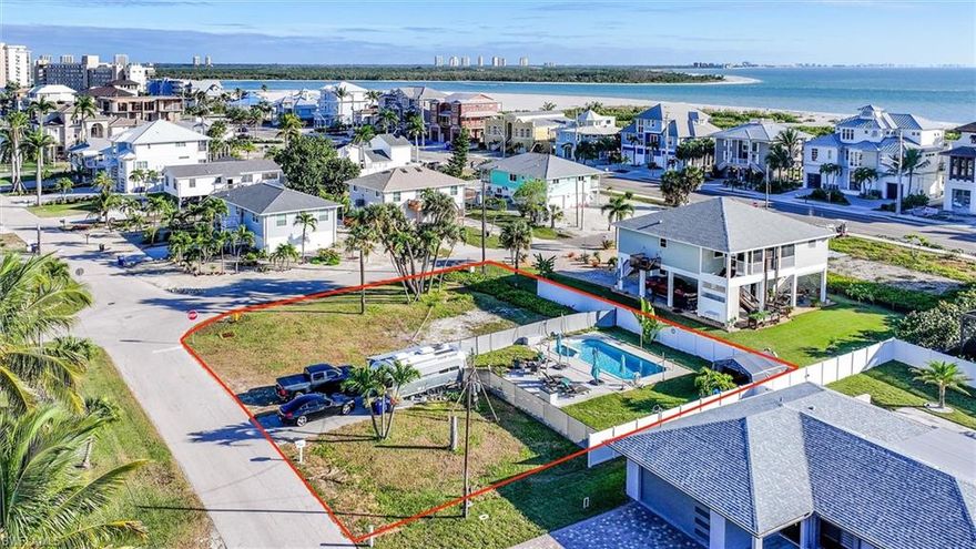 Prime Corner Lot with Approved Plans & Deeded Beach Access – Ready to Build (plans optional) 
Rare opportunity to own a large corner lot on the south end of Fort Myers Beach, just minutes from the beach with deeded beach access. This ¼-acre property is fully prepared for construction and offers the potential to build a substantial custom home in a neighborhood experiencing extensive new construction and renovations.
The property features a nice-sized pool and spa in working order, along with an irrigation well already installed. The seller had planned to build and has completed nearly the entire permitting process — allowing the next owner to save 6–9 months of time. 
FMB-approved architectural plans custom-designed for this lot are available for $25,000, and permit fees have already been paid. Simply bring your builder, pick up the permit, and start building.
Completed & Paid Items Include:
Custom two-story 4 BR / 4.5 BA architectural plans – $12,600
Florida Department of Environmental Protection permit – $750
Architectural engineering – $1,200
Environmental study – $750
Geotechnical test for piling depth – $3,875
Permit & impact fees – $5,600
Initial survey – $550
Civil engineering – $2,000
Fence installed on property line – $10,000
Additional Highlights:
Corner lot offering flexibility and design options
Deeded beach access
Pool & spa operational- New pool equipment and heater 
Irrigation well in place
Many new homes and renovations nearby
Easy access to Bonita Springs and Naples
Please inquire for details regarding buildable options and zoning allowances for this property.