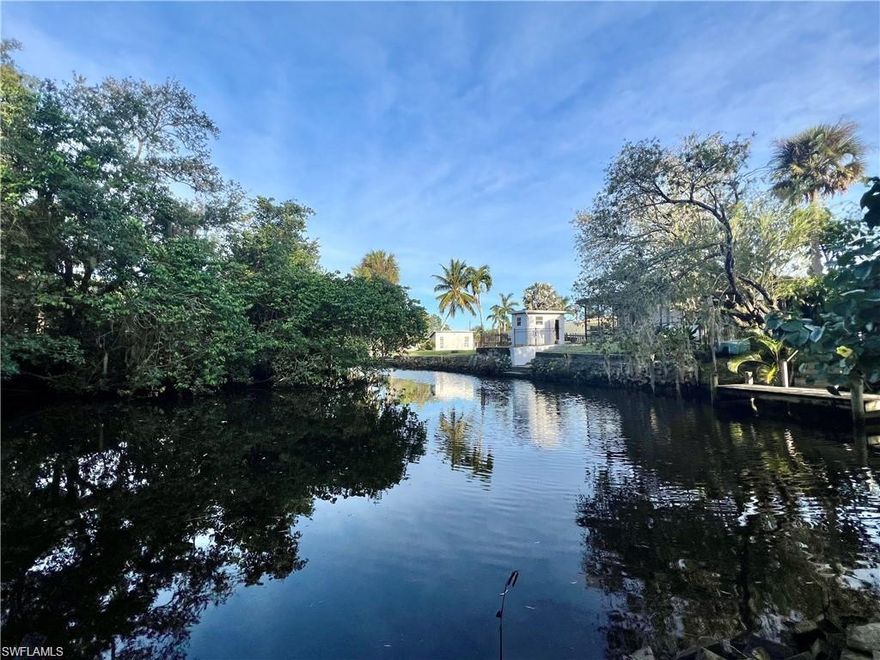 Gulf Access Waterfront Home Site in Historic Bonita springs!  This unique triangular shaped lot boasts 89' of water frontage on Oak Creek which leads to the Imperial River and further connects to the Gulf and the docks at Riverside Park in Downtown Bonita Springs.  The property features a variety of trees and plants and frequently visited by manatees and dolphins.