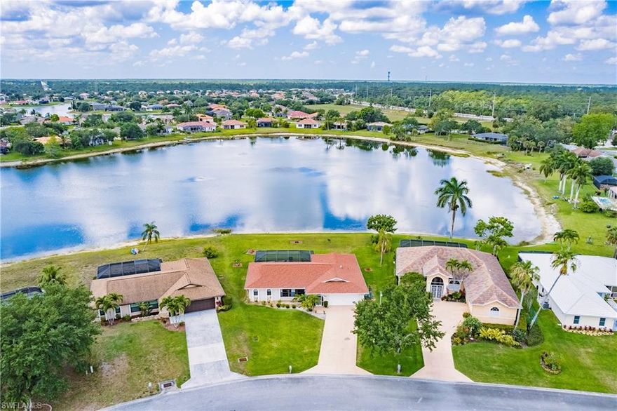 Beautiful Orange Tree community at it's best.  This lovely lakeside pool home has everything you could ask for in a picture perfect setting.  It has been exceptionally well cared for both inside and out. The home sits on one of the largest lakefront lots in the entire community. This 3 bed 2 bath home has an extra large eat in kitchen or 2nd family room.  Upgrades including new roof and pool cage in 2017. New driveway 2010, Replum in 2013 and a lovely fiberglass pool with a new pool pump.  The home has gas for cooking, the dryer and water heater.  Electronic doggie fence in place and ready for your puppies.  If you love the long 180 degree lake views, this home is for you.