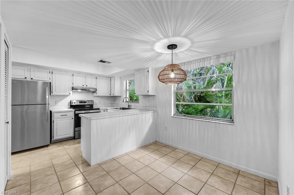 Photo of 3200 Binnacle DR #B4, NAPLES, FL 34103 (MLS # 225032597)