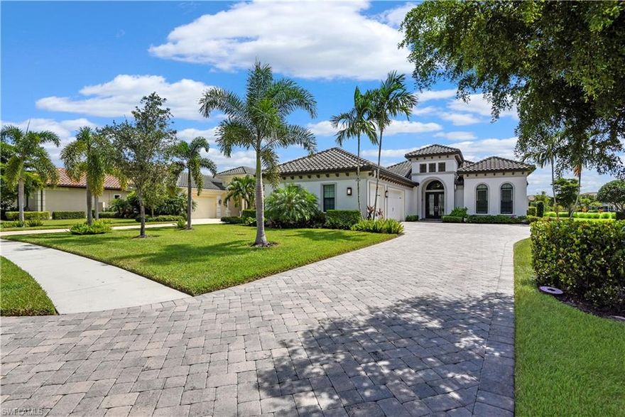 Luxury Country Club living at it's finest! This stunning home offers a great room design & a spacious outdoor living space featuring a custom designed heated pool & spa w/ sun shelf, summer kitchen, picture window screening, and a massive pool deck. The disappearing sliders leading from the dining/kitchen area to the pool lanai, volume ceilings accented w/ coffer detail & wide crown, French door entry w/ elegant design, picture windows, gorgeous tile flooring, and the open concept kitchen all create an incredible open & inviting feel to this home that offers over 3,000 sq ft of under air living space. You will love the gourmet kitchen w/ upgrades throughout-  wood cabinets w/ pull outs, induction cook-top, walk-in pantry, wall microwave & convection oven, granite counter-tops, and a state-of-the-art Thermador Column fridge/freezer. Each guest room has a private full bath, and the den offers enough room for a sitting area and a home office - all closets offer custom storage systems. Twin Eagles "where the pros play" is situated on 1,115 acres of unspoiled, natural tranquility offering 2 Championship Golf Courses & much more. Full Golf Membership Included!!