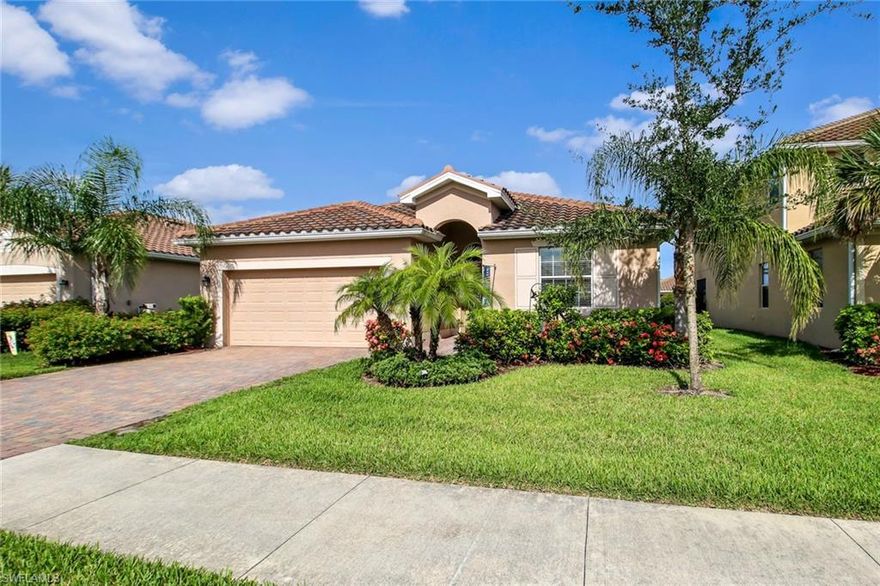 Move right in to this exceptional CAPRI floor plan! Offering 3 bedrooms, 2 full baths, beautiful laminate floors, granite counter tops and a 2-car garage. Make sure to take advantage of the natural light that enters throughout this home that also has crown molding and stainless steel appliances. Conveniently located within walking distance to the community pool & amenities! Orange Blossom Ranch is a newer North Naples gated community with LOW FEES featuring a community center, large pool, fitness center, tennis and basketball courts, playground, bocce and fishing pier!