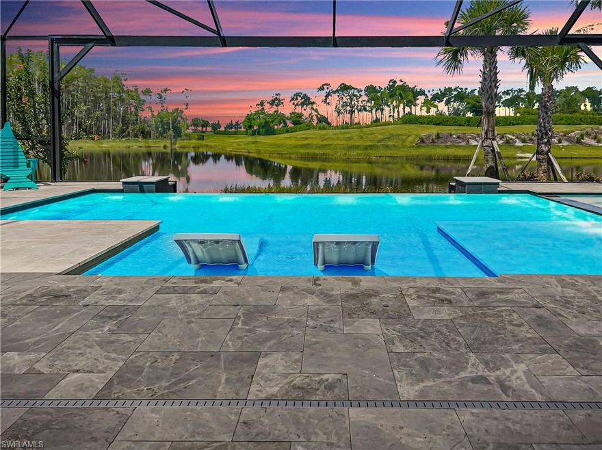 INFINITY EDGE CUSTOM POOL ~ WHOLE HOUSE GENERATOR ~ AIR COND & OVERSIZED 3 CAR GARAGE ~ EXTENDED LANAI w/ TRAVERTINE PAVERS ~ OUTDOOR KITCHEN ~ STORM SMART REMOTE SHUTTERS ~ KINETICO WATER FILTRATION SYSTEM are just a few of the upgrades in this NEARLY NEW Stonewater Loft Pulte home. Priced to SELL, this South Western-facing home boasts 4 bedrooms plus a den, 4 baths, an oversize loft with a beverage serving area, and beautiful evening sunsets.  This home has plenty of space for entertaining, with a huge kitchen island, an open family/dining/kitchen area, upgraded appliances, a large walk-in pantry, an outdoor kitchen with 42" gas grill, double beverage coolers & wood fire pizza oven. Wildblue is a NATURAL GAS community with true resort-style amenities, and an active boating, tennis, and pickleball community. Phase 2 of amenities to be completed 2nd quarter of 2023 with indoor/outdoor dining & resort-style pool and lakefront beach! Why buy new when you can get this nearly new home with so many after-market upgrades while also SAVING AT LEAST $15,000 in one-time new construction closing costs? Close to shopping, dining, beaches, and RSW International Airport. MOTIVATED SELLERS!