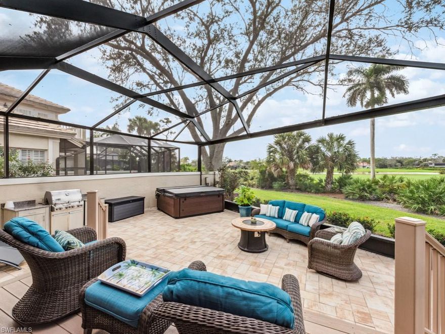 Welcome to this meticulously maintained two story open floor plan villa with an expansive golf view and a sunny southwest exposure, looking out to the Marsh golf course.  Features a remodeled lanai, including a new picture window cage and screen, hot tub, and outdoor kitchen. Wonderful open and airy Great Room floor plan with volume ceilings. Features include: 3 bedrooms, 2.5 baths, updated kitchen with custom cabinets and granite countertops, plantation shutters, new carpet throughout main living areas and new sundeck off master bedroom. All bathroom vanities newly replaced with quartz countertops. New A/C units in 2021.  4 sets of impact resistant sliding glass doors. Driveway, sidewalk and outdoor entertaining area are finished with stylish brick pavers. 2-car garage. The Enclave community has its own swimming pool a short walk away. Enclave is close to the Club and the main entrance to Bonita Bay. Enjoy the total lifestyle that not only this home offers, but Bonita Bay w/5 golf courses, private beach, marina, sports/racquet center w/ resort-style pool, lifestyle center w/ state-of-the-art fitness facility, luxury spa and salon, plus miles of walking & biking trails, & 3 parks.