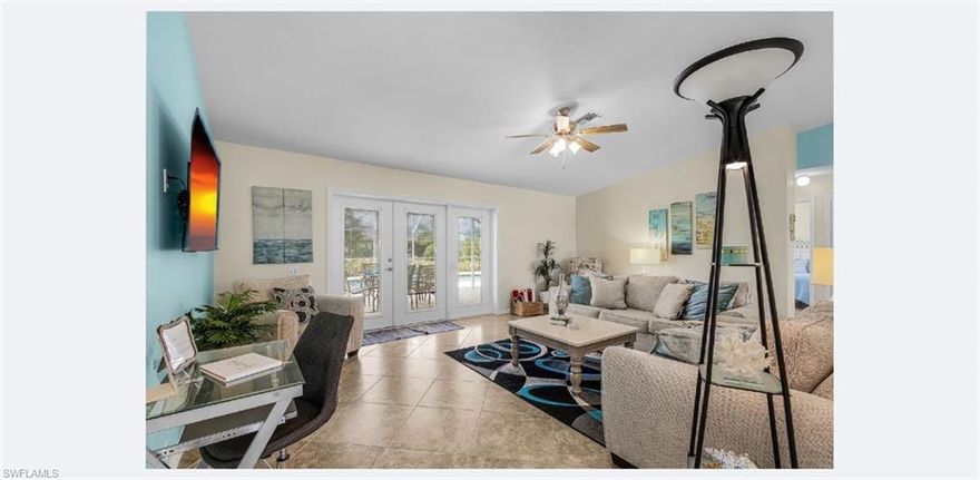 Welcome to this charming 3-bedroom, 2-bathroom single-family home in Cape Coral, offering 1,421 sq ft of comfortable living space. Built in 1992, this home features a functional layout with French doors, a screened lanai, and convenient in-garage laundry. Tile flooring flows throughout the home, creating a clean and bright living space. The screened lanai provides a perfect spot to relax or entertain outdoors, while the open living areas make the home feel spacious and inviting. Located in a convenient Cape Coral neighborhood, this home offers easy access to shopping, dining, and local amenities. Perfect for anyone looking to enjoy the Florida lifestyle.