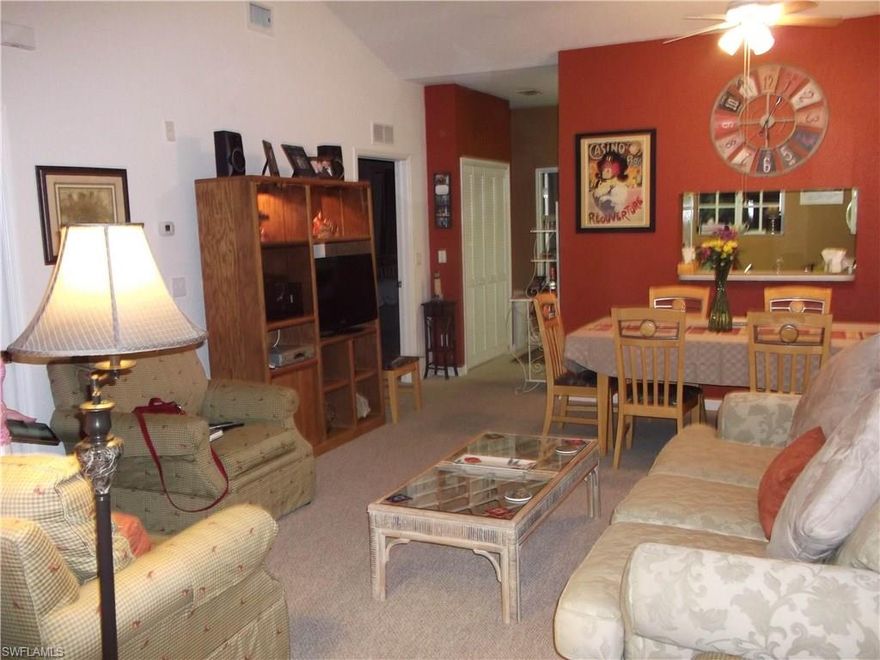 Updated and move in ready is this 3 bedroom 2 bath 2nd floor condo with soaring ceilings.  All furnishings except some personal items of decor are included in the purchase. Screened Lanai is nicely shaded and quiet.  Located in most desirable area of Ft Myers, close to many restaurants, shops and easy access to major roads, airport, beaches and shopping centers. Your pet is welcome.