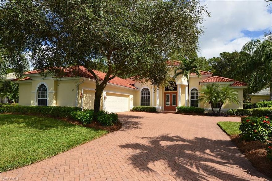 H.11190 - Large estate home in a bundled community just three and a half miles to the Gulf of Mexico.  It is ideally situated on a private, wooded preserve lot and has a three car, side loading garage.  The floor plan lends itself to a large family, lots of grandchildren or an aging parent.  Some of the features include volume ceilings, crown molding, plantation shutters, cherry cabinets and granite counter tops.  There is even storm protection including a generator and a 500 gallon propane tank.  Stonebridge is a bundled community offering golf, tennis, a fitness center, community pool and dining.  The facilities have recently undergone a major renovation.  Call today to view this special offering.