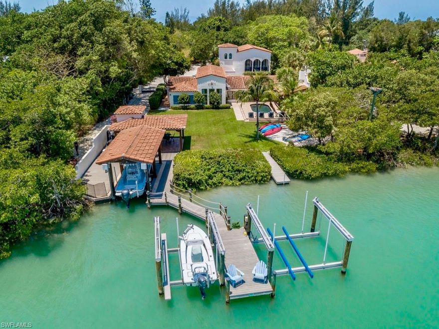 Awesome Spanish Colonial Revival waterfront estate w/roughly 2 acres of natural island landscape directly across the street from golf cart accessible deeded beach access. A fisherman's paradise w/a very unique/rare dock/entertainment set up featuring 3 boat lifts with 60,000 lb total capacity. Two covered boathouses & outdoor sitting areas. The main residence offers 4 lg. suite areas w/ gorgeous master retreat. Awesome gaming & kids fun room. wine cellar, Lg main great room & dining area w/lg chefs kitchen. Amazing design elements throughout that display the authentic architectural character that include cypress beams, Saltillo tile floors, hand fired decorative tiles & more. Outdoors, enjoy a lush landscaped waterfront setting. Open pool area, lots of porches, poolside cabana w/fireplace & more.The estate offers a full service two bedroom guesthouse w/a modern fun twist inside. Make memories w/this fantastic waterfront Captiva Island Estate that everyone will love and enjoy! This property also includes 16615 Captiva Drive.