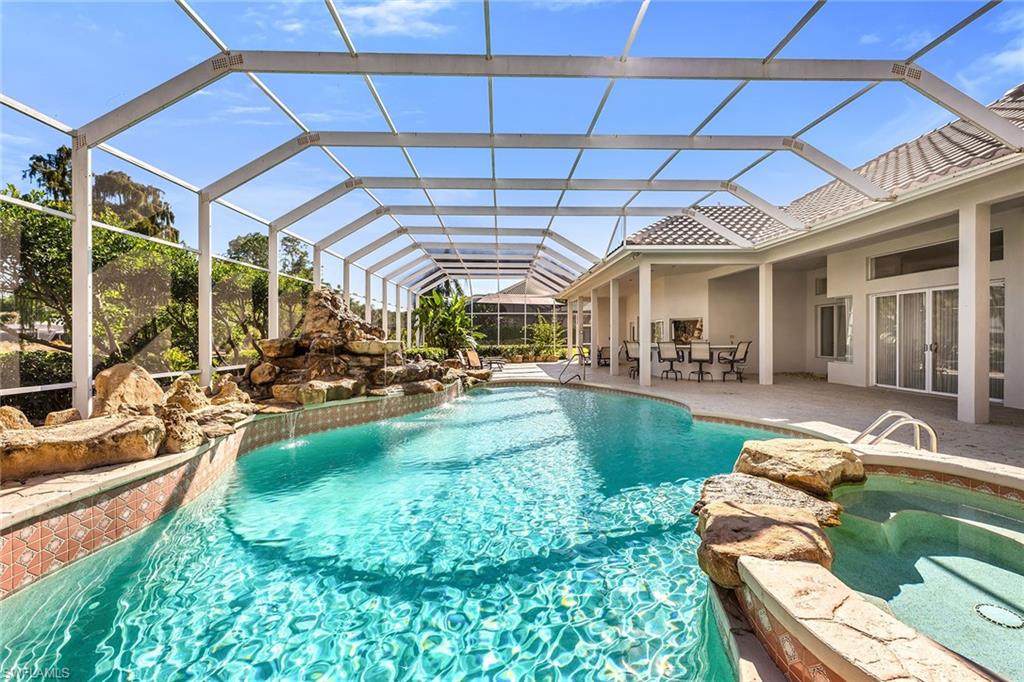 Photo of 13456 Pond Apple DR W, NAPLES, FL 34119 (MLS # 225079235)