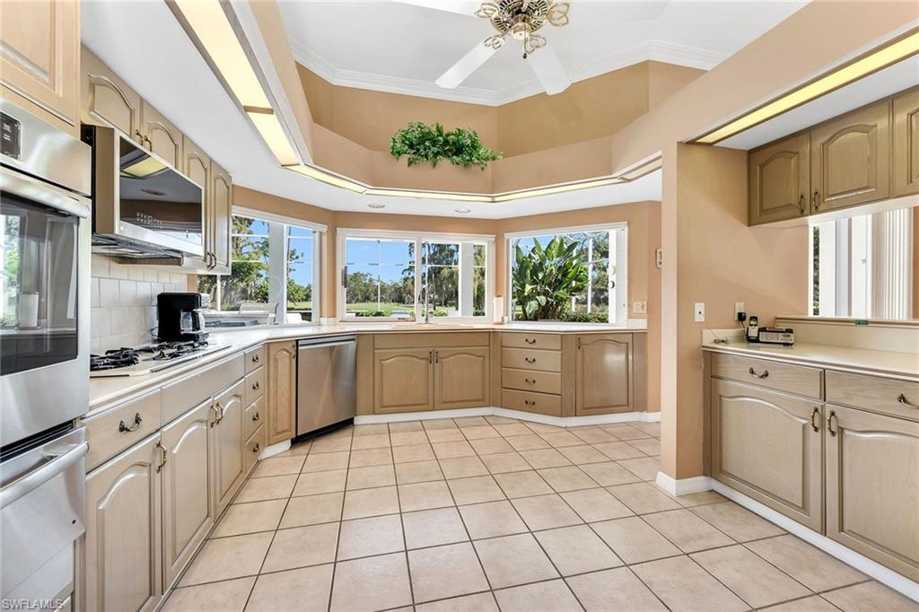Photo of 13456 Pond Apple DR W, NAPLES, FL 34119 (MLS # 225079235)