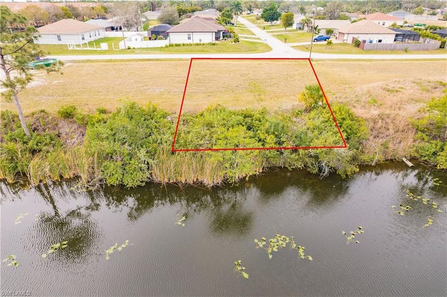 Welcome to your slice of paradise in North Cape Coral, Florida! NOT IN FLOOD ZONE, NO HOA, NO CDD!  This vacant lot presents an unparalleled opportunity to build your dream home in a serene waterfront setting with plenty of room for outdoor living spaces and landscaping. Located along a tranquil Jamaica freshwater canal, this property offers the perfect blend of peaceful living and convenient access to nearby amenities. Enjoy access to endless miles of freshwater canals, ideal for fishing, kayaking, and boating right from your backyard. Convenient boat ramps nearby make it easy to launch your watercraft and embark on adventures at your leisure. Cape Coral is experiencing rapid growth, making it an exciting place to live! You'll find a Publix shopping plaza just a short walk away, and major retailers, grocery stores, and restaurants are all within a convenient 10 to 15-minute drive from the area. Not to mention an approximate 5-minute drive to the Cape Coral VA clinic. The highly anticipated Gulf Gateway Resort and Marina project is underway, promising to bring luxury and excellence to the area. Don't miss out on securing your slice of waterfront paradise before land becomes scarce!