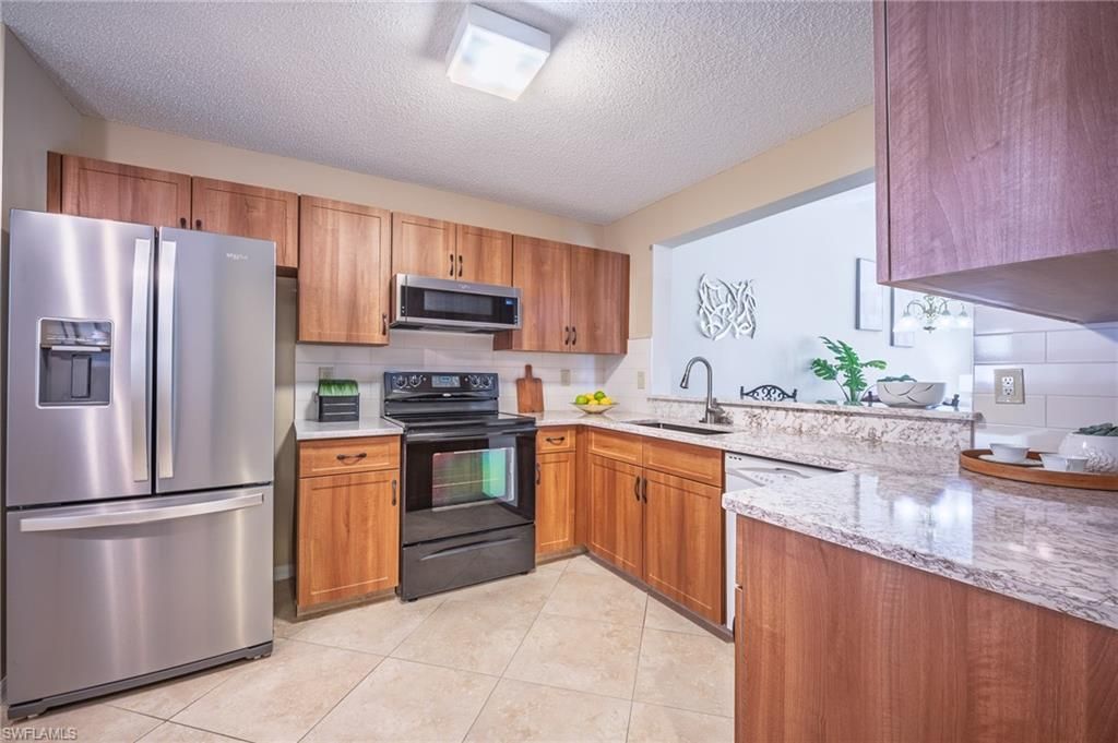Photo of 613 Squire CIR #204, NAPLES, FL 34104 (MLS # 226005088)