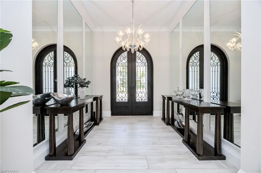 Photo of 16952 Fairgrove WAY, NAPLES, FL 34110 (MLS # 226011603)