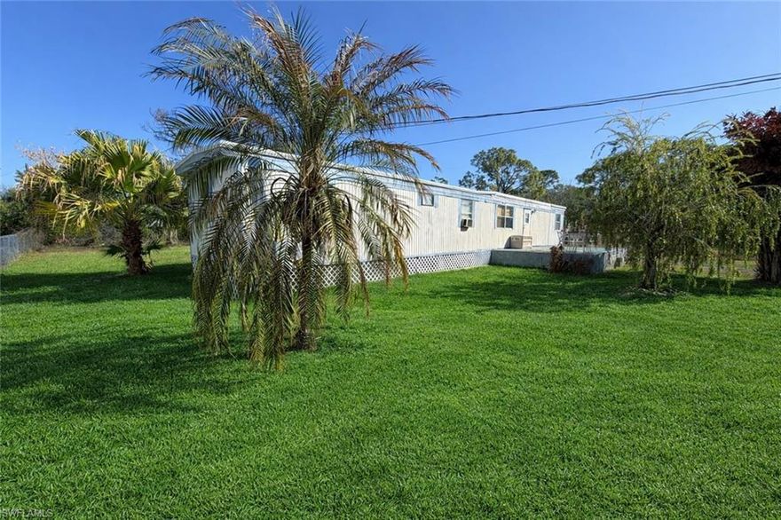 Check out this great property! Loaded with potential this manufactured home sits on just under 1/2 acre of your own land!!! Located in a prime location, this property offers convenience and accessibility to all the amenities you could ever need. just a short 15 minute drive to everything Ft. Myers has to offer. It's close enough to the interstate to get your trip started quickly but far enough away to relax and unwind. The large lot provides ample space for outdoor activities, gardening, or simply enjoying the fresh air. With great potential for customization and personalization, this home is just waiting for your creative touch to make it truly your own. Imagine the possibilities of turning this space into your own personal oasis, where you can relax and unwind after a long day. Whether you're looking for a peaceful retreat or a place to entertain friends and family, this home has it all. Don't miss out on the opportunity to make this your forever dream and start living the life you've always wanted. Your fresh start begins here.
