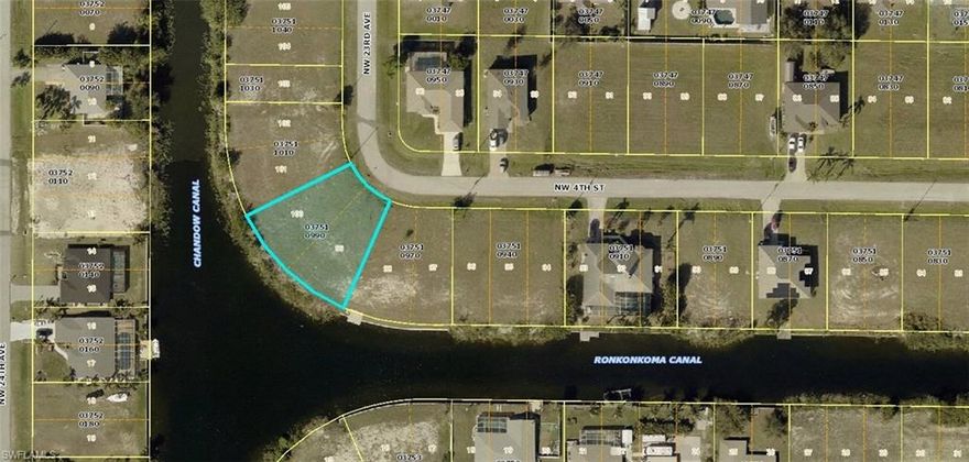 Discover the potential of this vacant waterfront lot located at 400 NW 23rd Ave in the rapidly expanding NW Cape Coral area. Positioned on intersecting freshwater canals, this property offers a unique opportunity to create a custom waterfront residence tailored to your vision. The serene water views provide a tranquil backdrop, perfect for those seeking a harmonious blend of nature and modern living.

Situated off Burnt Store Road, this lot is part of a fast-growing community, making it an ideal investment for future development. Whether you're looking to build a personal retreat or a standout property in a thriving neighborhood, this location provides endless possibilities.

Whether you are ready to build your dream home now or in the future, this is a great opportunity to own a piece of paradise. Take advantage of owning this desirable lot today.