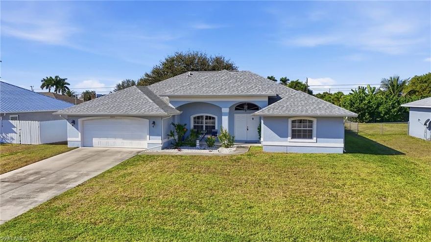 Welcome to this beautifully maintained 2006-built single-family POOL home in Cape Coral. Offering over 2,200 sq ft of spacious living, this property features 3 oversized bedrooms, 2 bathrooms, two family rooms, and vaulted ceilings that make the home feel bright and open. The primary suite includes a large soaking tub for ultimate relaxation. This home also comes partially furnished for added convenience. Enjoy peace of mind with NO assessments, a LOW-cost flood insurance policy, a 2023 roof, and a 2019 A/C.
Step outside to your private oasis—an impressive screened-in pool complete with a waterfall feature, built-in table, and seating area perfect for cooling off with a drink in hand. This home delivers comfort, privacy, and true Florida living. Just a 20 minute drive to Downtown Cape Coral & 12 minutes to Tarpon Point. Centrally located to all of the BIG attractions. Don't miss out!