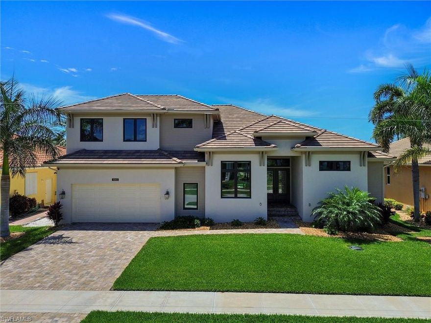 Two years NEW! This Stunning Custom Home is designed for Comfort, Style, and Entertaining
Step through impressive 8-foot doors into a bright, welcoming foyer that opens to a spacious, open-concept living area—perfect for both relaxed everyday living and hosting guests.
The Great Room flows effortlessly to the outdoor lanai and pool/spa through a dramatic 10-foot sliding glass door that fully disappears, blending indoor and outdoor living. Electric shutters enclose the lanai, offering convenience and protection.
Every detail of this home has been thoughtfully designed. The chef’s kitchen features beautiful cherry wood cabinetry with soft-close doors and pull-out shelves, sleek black stainless KitchenAid appliances, including a gas range, and elegant Cambria quartz countertops. Box beam ceilings add architectural charm to both the kitchen and Great Room, while a dining room breakfast bar provides extra storage and serving space. A large pantry and additional first-floor storage ensure everything has its place.  Elegant finishes continue throughout, including solid wood doors with detailed trim, upgraded baseboards, and unique touches such as shiplap ceilings in the foyer and lanai. Even the laundry and powder rooms are finished with the same level of care.
The home offers three spacious en suite bedrooms, each with walk-in closets and Hunter Douglas blinds, along with beautifully designed bathrooms featuring Kohler fixtures and custom tilework. With 8 separate thermostat zones, comfort can be tailored throughout the home.  
Additional highlights include a large dedicated office or flex room, an expansive upstairs storage area, and a well-equipped laundry space. The oversized two-car garage provides room for vehicles and more, with a durable polyaspartic floor, its own split A/C unit, and reinforced walls for easy storage installationEnjoy all-day sunshine on the south-facing pool and lanai, complete with a convenient pool bath. A tankless water heater with recirculating system ensures efficiency and comfort throughout the home.
For added peace of mind, the home is equipped with a 38KW Generac “Quiet Series” generator—keeping you secure during hurricane season.
This exceptional home is designed to impress even the most discerning buyer.