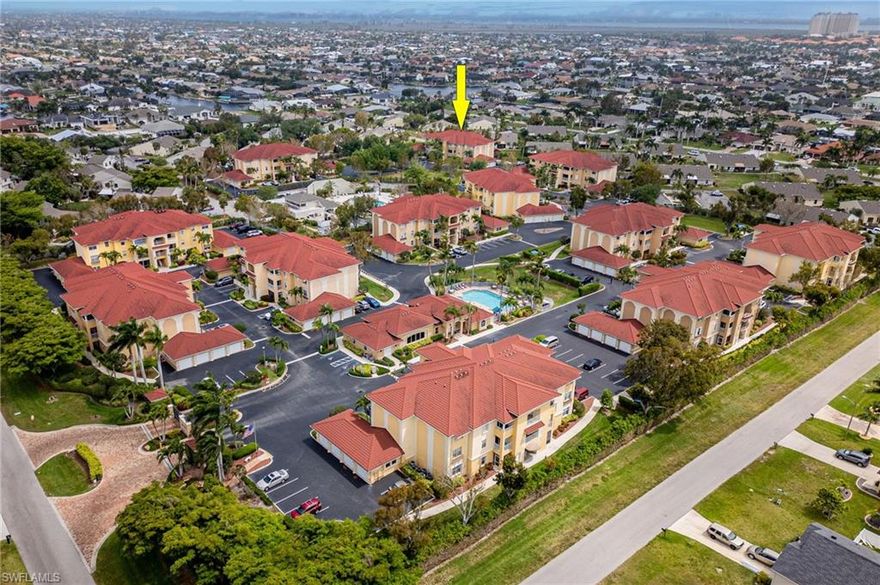 Welcome to Porto Vista, a gated community in the heart of Southwest Cape Coral! This spacious 2-bedroom + den, 2-bath first-floor residence with a private 1-car garage offers the perfect blend of comfort, convenience, and coastal lifestyle.  Just a short stroll to Cape Harbour, you’ll enjoy easy access to waterfront dining, boutique shopping, marina views, and year-round events.  Inside, the thoughtfully designed floor plan features a large open living area, versatile den ideal for a home office or guest space, and a well-appointed kitchen with real wood cabinetry, granite countertops, and stainless steel appliances. The primary suite includes a beautifully updated shower (2019) and generous closet space.  Major updates provide peace of mind:  • Roof replaced in 2018
• A/C & water heater replaced in 2021  • Windows & sliding glass door replaced in 2021  • Interior painted in 2022  No water intrusion from Hurricane Ian — high and dry location.  Being sold Turnkey, this condo is move-in ready and ideal as a full-time residence, seasonal retreat, or investment opportunity.   Enjoy low-maintenance living in one of Southwest Cape Coral’s most desirable locations!