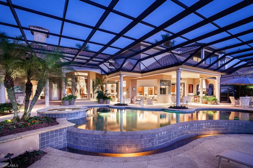 This Bonita Bay casually elegant estate home with architectural distinction is evident at every turn with marble floors, warm natural woods & soaring ceilings but the comfort of this home is not lost in its extraordinary details. The owner’s suite features a windowed sitting area w/private access to the pool & deck. Pamper yourself in the soaking tub surrounded by your privacy garden. A dedicated bar includes a wine chiller & beverage fridge. Kitchen includes a butler’s pantry, breakfast bar, dine-in kitchen & three dishwashers! The great room flows seamlessly with its disappearing doors to your outdoor oasis of forever LAKE views. Exterior elements include the lagoon style infinity edge pool with its organic shape, pleasing curves and tanning ledge surrounded by flagstone decking and a spa. Tucked away for those romantic moments is the gas fireplace. A summer kitchen AND a cabana bath completes the outdoor area. PREFERRED feature of this home is the ease of interior to exterior living areas for homeowner & guests alike that includes numerous relaxation areas and alfresco dining options. Shut the world away in your private enclave at the Rookery Lake with 105 ft of waterfront.