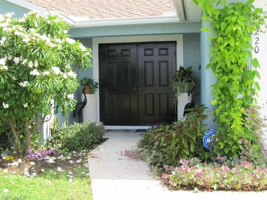 Lovely 3 bedroom, 2 bath home in Northwest Cape, near schools, shopping, and easy commute to downtown Fort Myers businesses. Kitchen has double ovens and sinks, breakfast bar, plant shelf and open to great room. Split bedroom plan with Jack & Jill bathroom between Bedroom 2 & 3. Master bath - double sinks, dual shower head and separate tub and shower. Master suite hallway is lined with closets and sliders onto the lanai. All bedrooms have oversized walk in closets. Front entrance foyer opens to an additional room that can be used as a den, formal living room, home office or music room. Exterior freshly painted in April 2014 Interior painted in September 2014 - New carpets September 2014 - fruit trees and landscaping updated in last 6 months. Room for a pool.