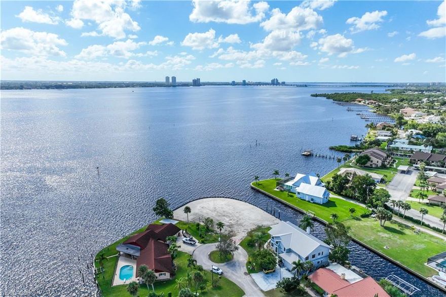 Discover the epitome of waterfront living on this breathtaking panoramic peninsula property! With over 340 feet of waterfront, this is a once-in-a-lifetime opportunity to own a piece of paradise. The property boasts 200 feet of unspoiled riverfront views, offering a tranquil escape and captivating sunsets. Additionally, it features 100 feet of tucked-away canal, perfect for your boat storage needs, ensuring easy access to the open waters whenever you desire. Nestled at the end of a quiet cul-de-sac, this property is in a peaceful countryside neighborhood, providing a serene and private retreat. Enjoy the convenience of biking distance to amenities, including a Publix and pharmacy, ensuring that your daily needs are just moments away. Located just a 4-mile drive from the interstate and a quick 20-minute drive from the Fort Myers Airport, this location offers instant connectivity to major transportation hubs. This property is primed for your dream development. It comes equipped with a new taller seawall, a soil test report, and a septic layout already approved by the county, saving you time and hassle. Don't miss out on this incredible opportunity to create your waterfront paradise.